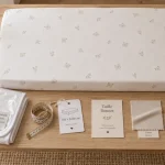 Drap housse lit bébé ajusté : coins bien tendus, sans plis